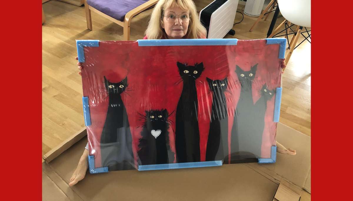 Schwarze Katzenfamilie auf Acrylglas