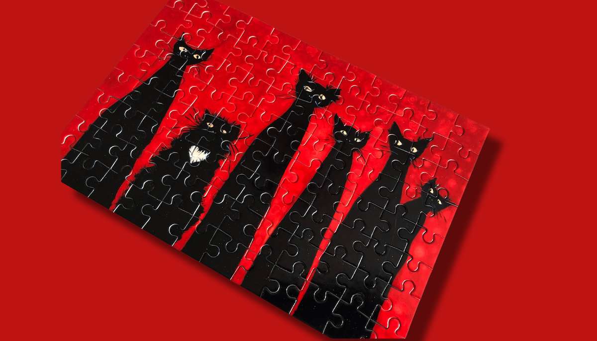 Schwarze Katzenfamilie auf Acrylglas